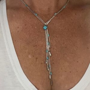 Delicate silver and turquoise bolo style necklace